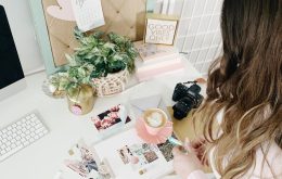 pink and white cards and photos